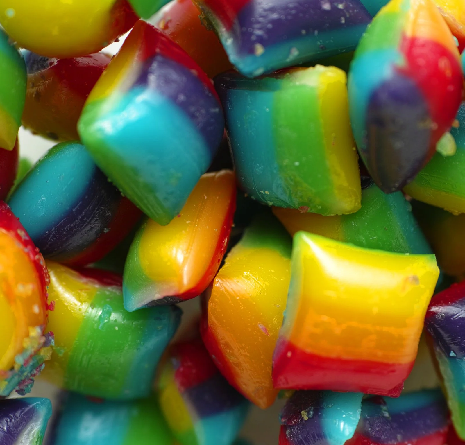 A close up of brightly coloured sweets and candies